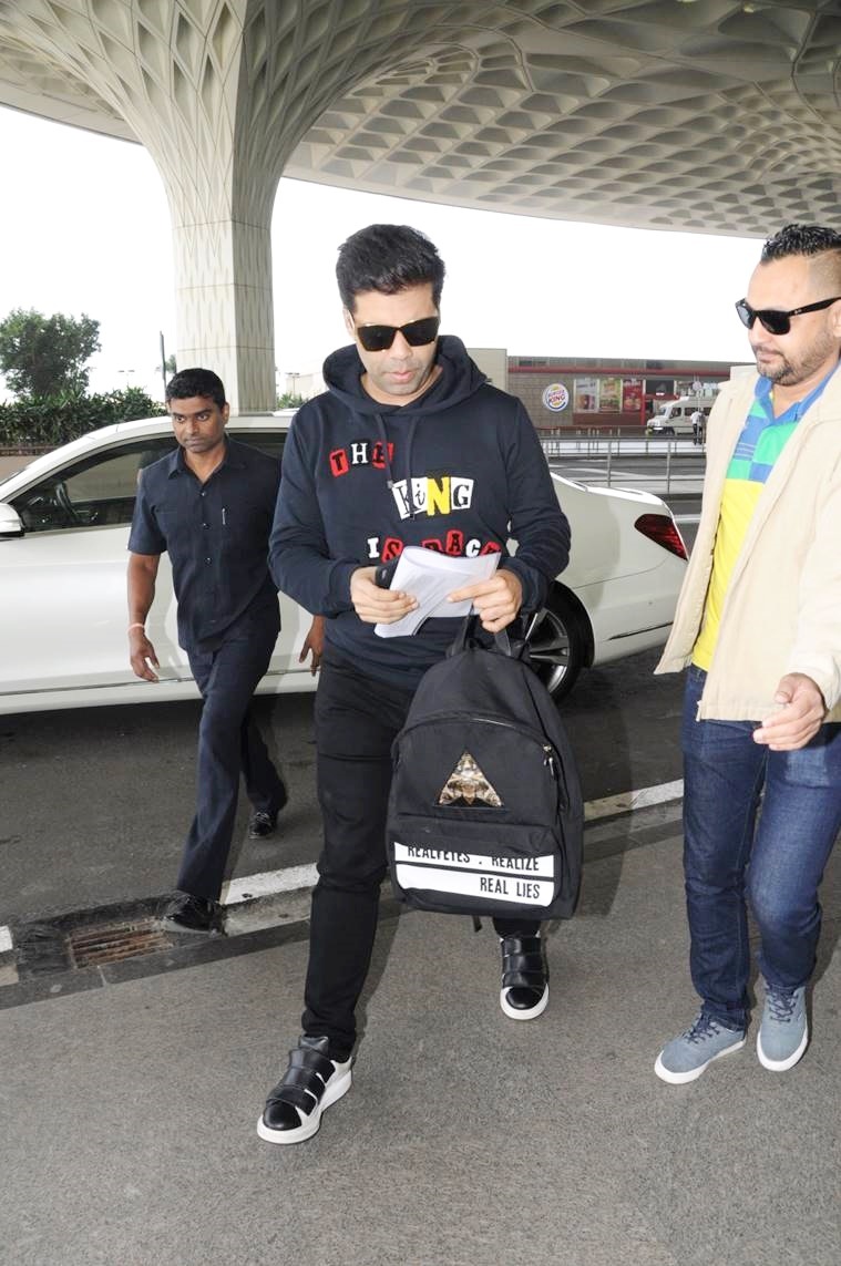 Karan Johar, Karan Johar bags, Karan Johar shoes, Karan Johar fashion, Karan Johar airport looks, Karan Johar movies, bollywood fashion, indian express, indian express news
