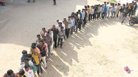 jr27-chunav-01
Villagers queuing up to cast their votes in vekria village of Ahmedabad district, on Tuesday.
Express photo by Javed Raja
27-12-2016
