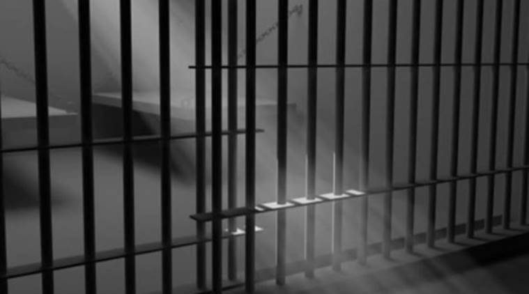Two prisoners flee, jail staff among 6 booked
