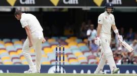 Joe Root walks back after getting out