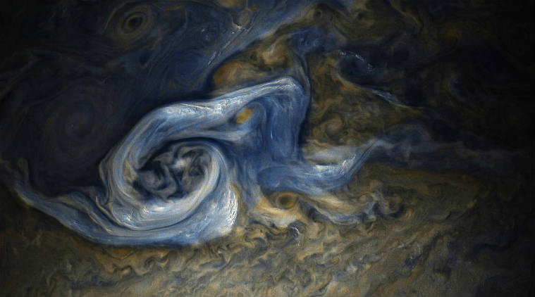 NASA's Juno spacecraft beamed back a stunning image of a massive, raging storm in Jupiter's northern hemisphere.