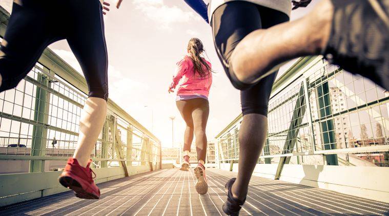 marathon, fitness enthusiasts, stretching, squatting, bending, training, indian express, indian express news