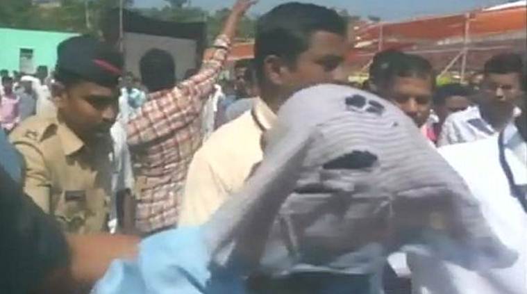 Devendra Fadnavis, Maharashtra, Ralegan Siddhi, Man arrested, ink, indian express, india news