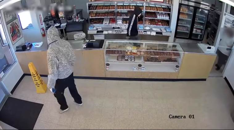 funny robbery videos, men steal donuts, thieves leave behind donuts, thieves treat customers, indian express, indian express news