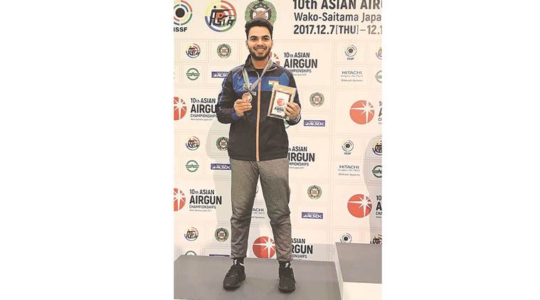 arjun babuta, chandigarh shooter, asian airgun championship 2017, waki city japan, sharp shooter, silver medal, junior category, 10 m rifle pistol category, indian express