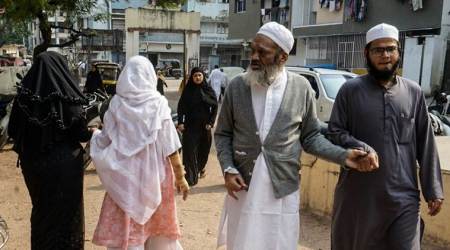 Members of the Muslim community in Gujarat visit polling booths