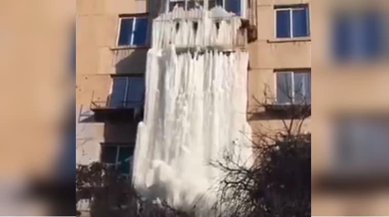 Video of a 10m-tall frozen waterfall (thanks to pipe leak) from ...