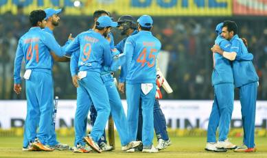 Indian players congratulate each other after winning the second T20 against Sri Lanka in Indore