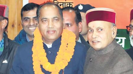 Former CM Prem Kumar Dhumal (right) and CM Jai Ram Thakur (File)