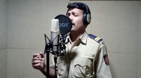 maharashtra police, jalgaon police, jalgaon police singing star, police viral singing video, Sanghapal Tayde, viral videos, indian express