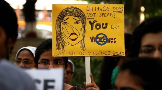 Protestors hold placards during a protest in Dadar Mumbai, demanding justice for Jisha, a law student whose body was found mutilated more than a week back in Perumbavoor, Kerala. Express Photo by Amit chakravarty. 11.05.2016. Mumbai. *** Local Caption *** Protestors hold placards during a protest in Dadar Mumbai, demanding justice for Jisha, a law student whose body was found mutilated more than a week back in Perumbavoor, Kerala.