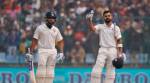 Virat Kohli gestures after scoring a double century