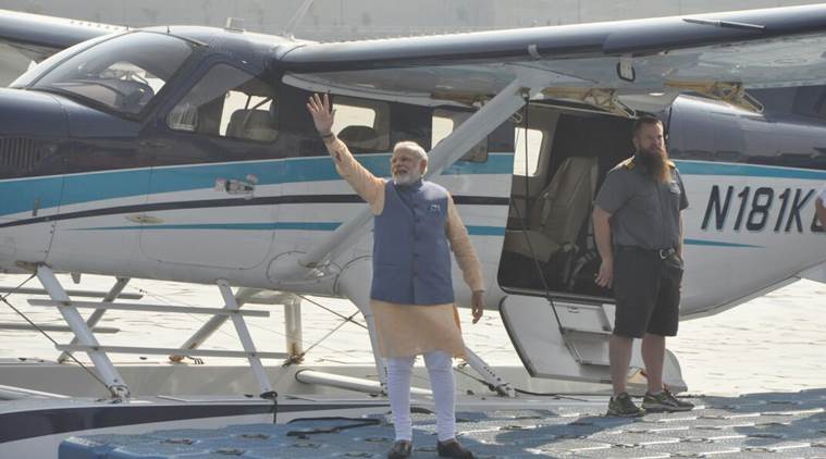 Image result for Gujarat polls: PM Modi travels in sea plane from Sabarmati river to Dharoi Dam