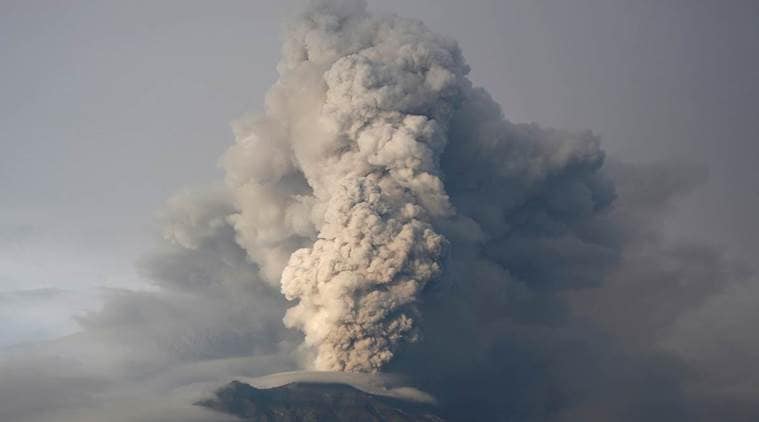 Bali volcano hurls lava and ash, airport unaffected ...