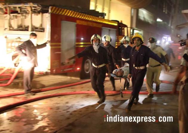 mumbai fire, mumbai fire photos, london taxi bar fire, mumbai bar fire images, lower parel fire pictures, mumbai taxi bar fire pics, mumbai fire latest pics, kamala hills fire photos, indian express