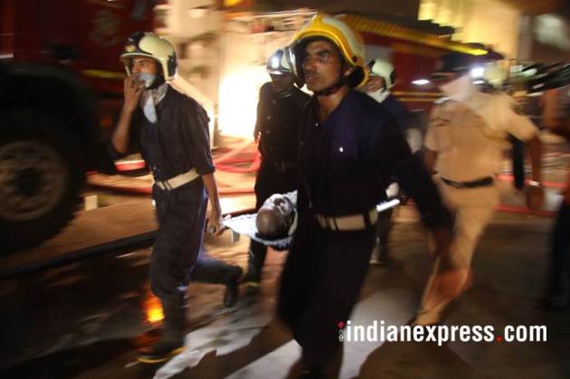 mumbai fire, mumbai fire photos, london taxi bar fire, mumbai bar fire images, lower parel fire pictures, mumbai taxi bar fire pics, mumbai fire latest pics, kamala hills fire photos, indian express