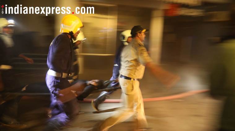 mumbai fire, mumbai fire photos, london taxi bar fire, mumbai bar fire images, lower parel fire pictures, mumbai taxi bar fire pics, mumbai fire latest pics, kamala hills fire photos, indian express