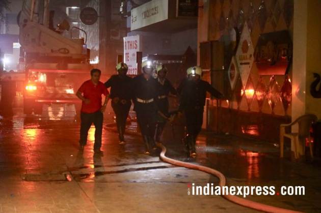 mumbai fire, mumbai fire photos, london taxi bar fire, mumbai bar fire images, lower parel fire pictures, mumbai taxi bar fire pics, mumbai fire latest pics, kamala hills fire photos, indian express