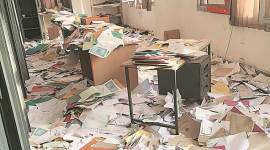 The documents lying scattered at the registration branch of the no alt set