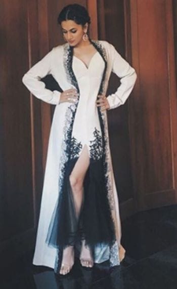 Huma Qureshi looked glamorous in an ivory gown, with a plunging neckline  and silver embellished bralette Photo
