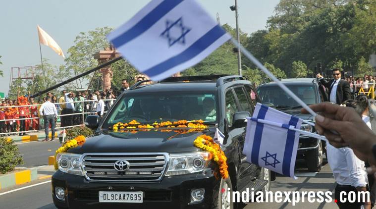 Prime Minister Narendra Modi with Israeli Prime Minister Benjamin Netanyahu and his Wife Sara during road show in Ahmedabad on Wednesday.