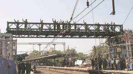 Army constructing foot over bridge at Ambivali railway station