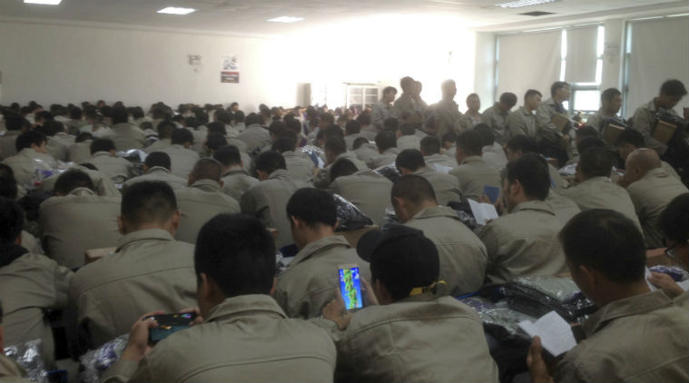 Apple China supplier, Catch Apple supplier, Apple supplier work conditions, iPhone parts, China Labour Watch, MacBooks, wastewater, labour rights violations, dormitories