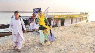 In Assam river islands, boats, ASHA workers push effort