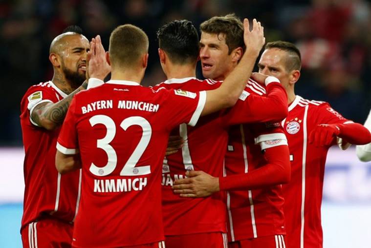 Robert Lewandowski, Thomas Mueller double help Bayern Munich beat ...