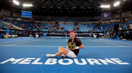 Tomas Berdych poses with the trophy after winning Tie Break Tens in Melbourne