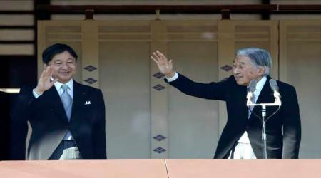 Japan emperor greets cheering crowd