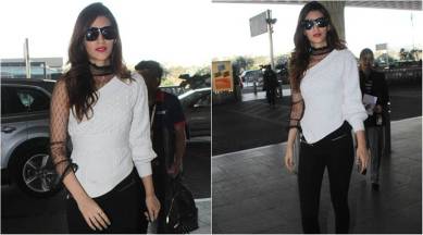 Kriti Sanon, Kriti Sanon latest photos, Kriti Sanon fashion, Kriti Sanon airport style, Kriti Sanon mesh top, Kriti Sanon one-shouldered sleeves