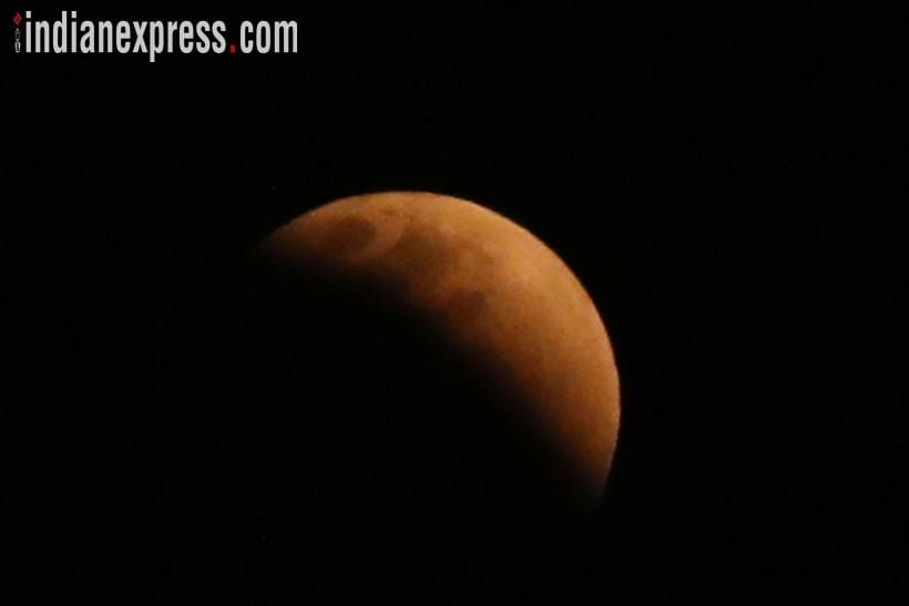 Lunar eclipse 2018: Super Blue Blood Moon was seen in the skies of several Indian cities including Delhi, Jaipur, Bhopal, Varanasi and Kolkata. (Source: Express photo by Partha Paul)