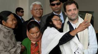 Rahul gandhi, suit-boot ki sarkar, rahul gandhi attacks modi, rahul gandhi in shillong, rahul gandhi jacket, meghalaya BJP, north east news