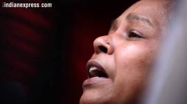 Ankit's mother cries inconsolably outside her resident in Raghuvir Nagar area of New Delhi on Friday. (Express photo/Praveen Khanna)