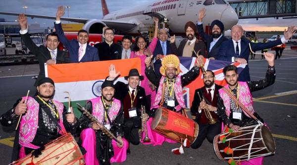 Amritsar and Birmingham air India flight, Birmingham air India flight, Amritsar air India flight, dhol performance at Amritsar and Birmingham air India flight, viral video, facebook viral video, Indian express, trending news