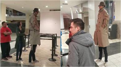 black panther, black panther screening, kids disguise as tall man black panther, two kids dressed as one man black panther, trench coat, vincent adultman, little rascal trench coat trick, indian express, viral news