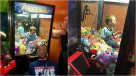 kid stuck in a machine, boy climbs into a machine,