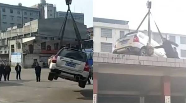 viral video, social media, viral china video, car lifted on building roof, china news