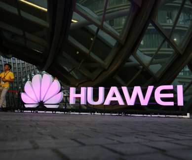 Huawei UK investment, US smartphone industry, Chinese smartphone makers, national security threats, ARM chips, UK PM Theresa May, Vodafone, Brexit, European Union, AT&T