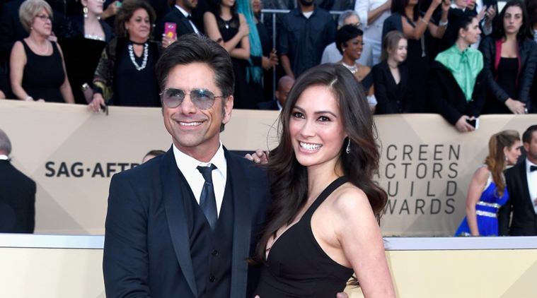 John Stamos and Caitlin McHugh
