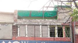 Disappearing act: Signboards removed from the office of the World Key Immigration Company at SCF 48, Phase 3B2, in Mohali, on Sunday. (Express photo/Jasbir Malhi)