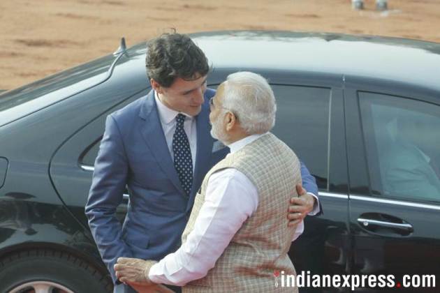 Justin Trudeau, Narendra Modi, Modi meets Trudeau, PM Modi hugs Trudeau, Trudeau India photos, Ceremonial Reception, Rashtrapati Bhavan, Indian Express