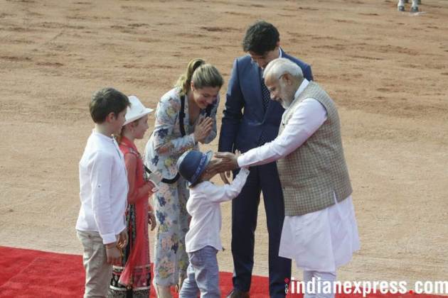 Justin Trudeau, Narendra Modi, Modi meets Trudeau, PM Modi hugs Trudeau, Trudeau India photos, Ceremonial Reception, Rashtrapati Bhavan, Indian Express