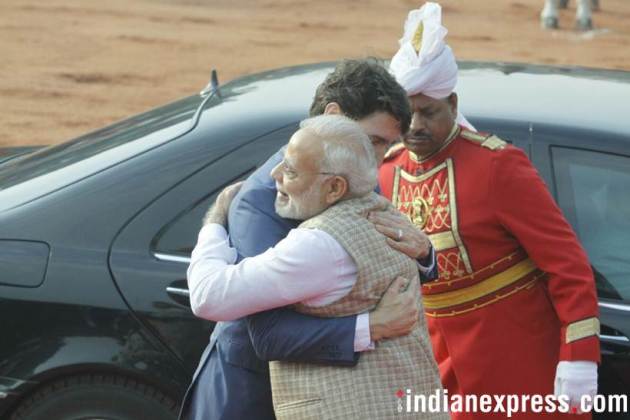 Justin Trudeau, Narendra Modi, Modi meets Trudeau, PM Modi hugs Trudeau, Trudeau India photos, Ceremonial Reception, Rashtrapati Bhavan, Indian Express