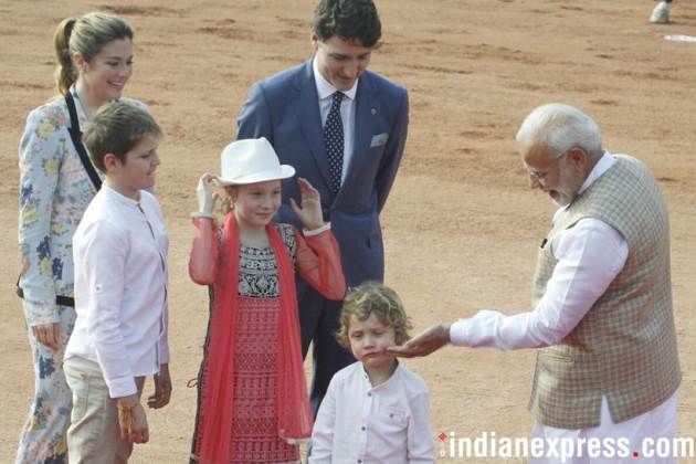 Justin Trudeau, Narendra Modi, Modi meets Trudeau, PM Modi hugs Trudeau, Trudeau India photos, Ceremonial Reception, Rashtrapati Bhavan, Indian Express