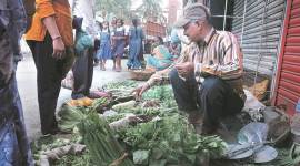 vegetable vendors, small scale entrepreneurs, development economists, moneylenders, debt payoff, indian express