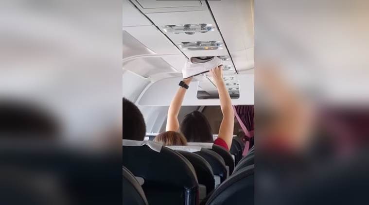 VIDEO: Woman dries underwear inside a packed flight 