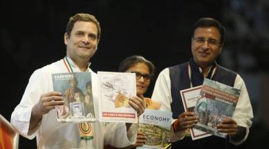 Congress President Rahul Gandhi with party spokesperson Randeep Surjewala at the 84th Plenary Session in New Delhi on Saturday. (Express photo/Praveen Jain)
