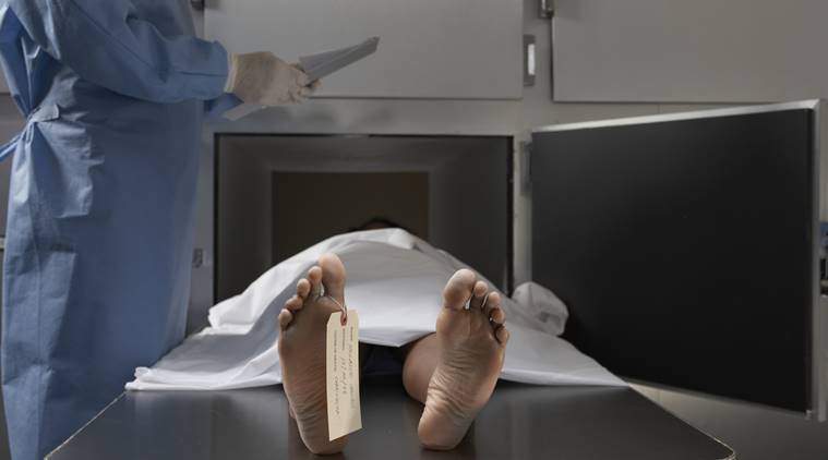 man alive sent for funeral, dead husband sent for funeral, posthumous cosmetics